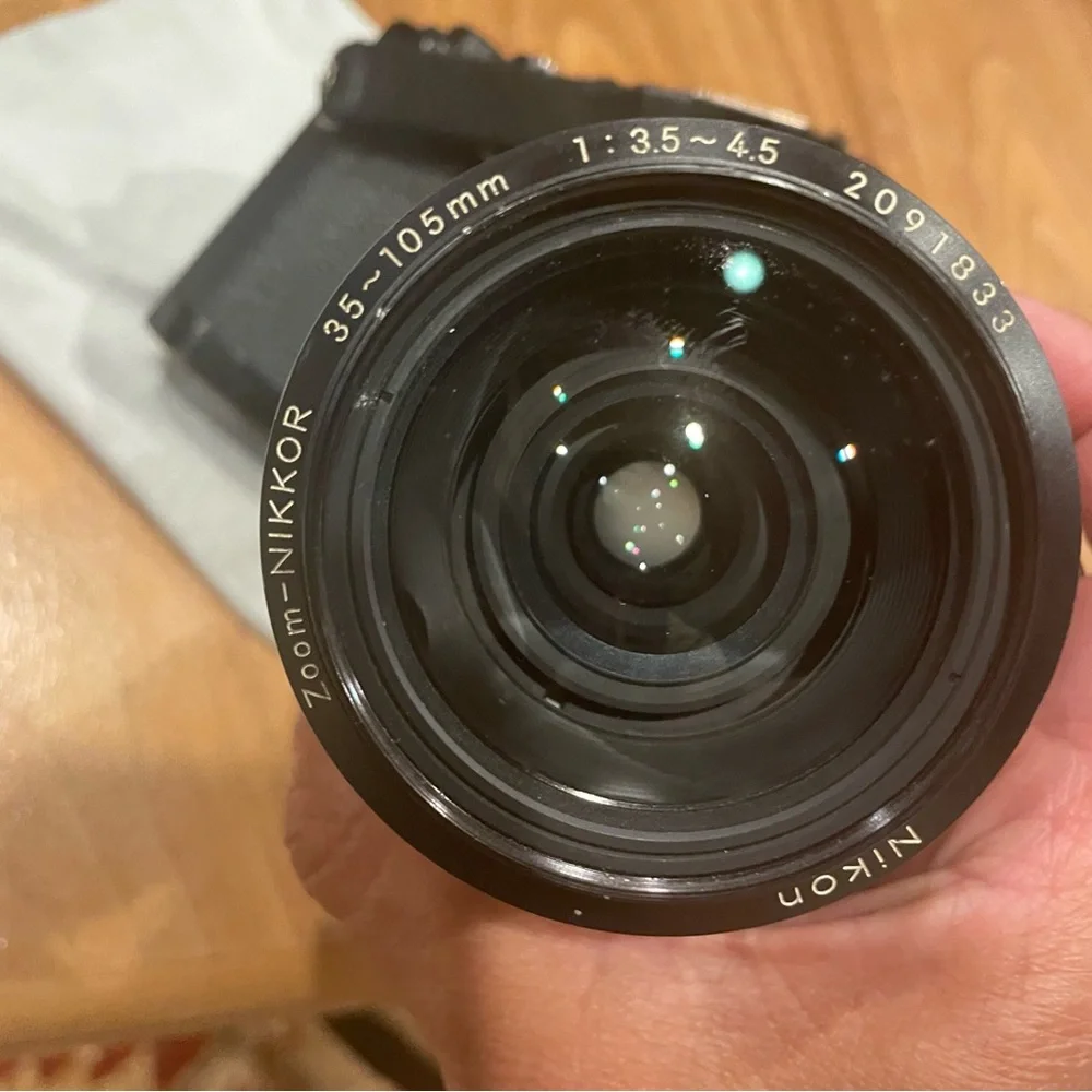 Vintage Nikon FM2 black camera with lens